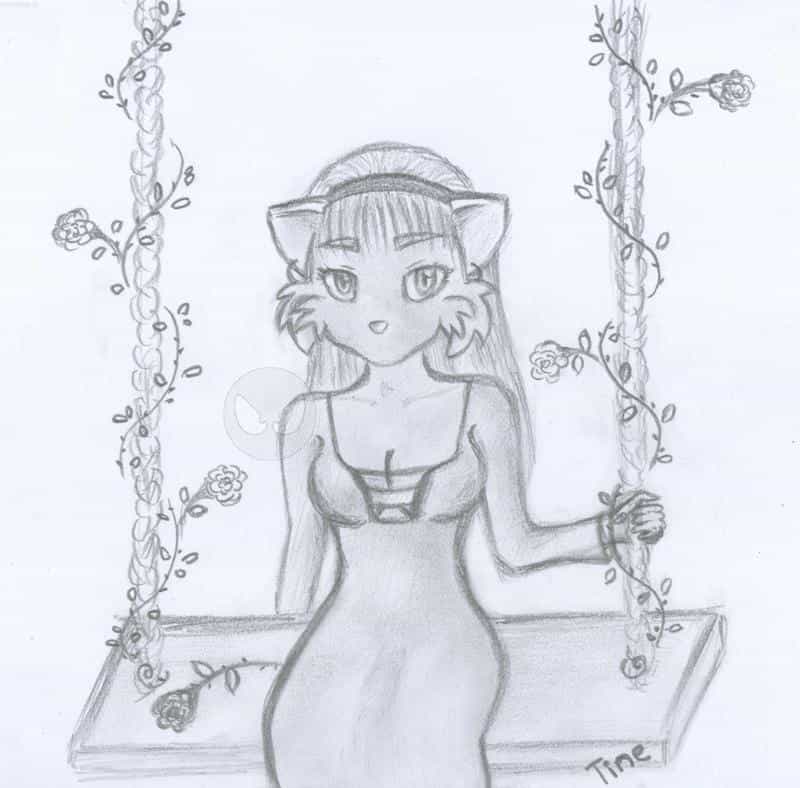 Kitty auf einer Schaukel