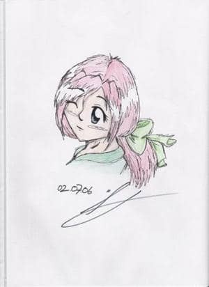 mädchen mit roten haaren und grüner schleife